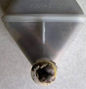 close up of gunge in pressure chamber