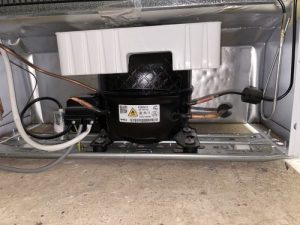 Can you lay fridge or freezer on its side or back when moving it